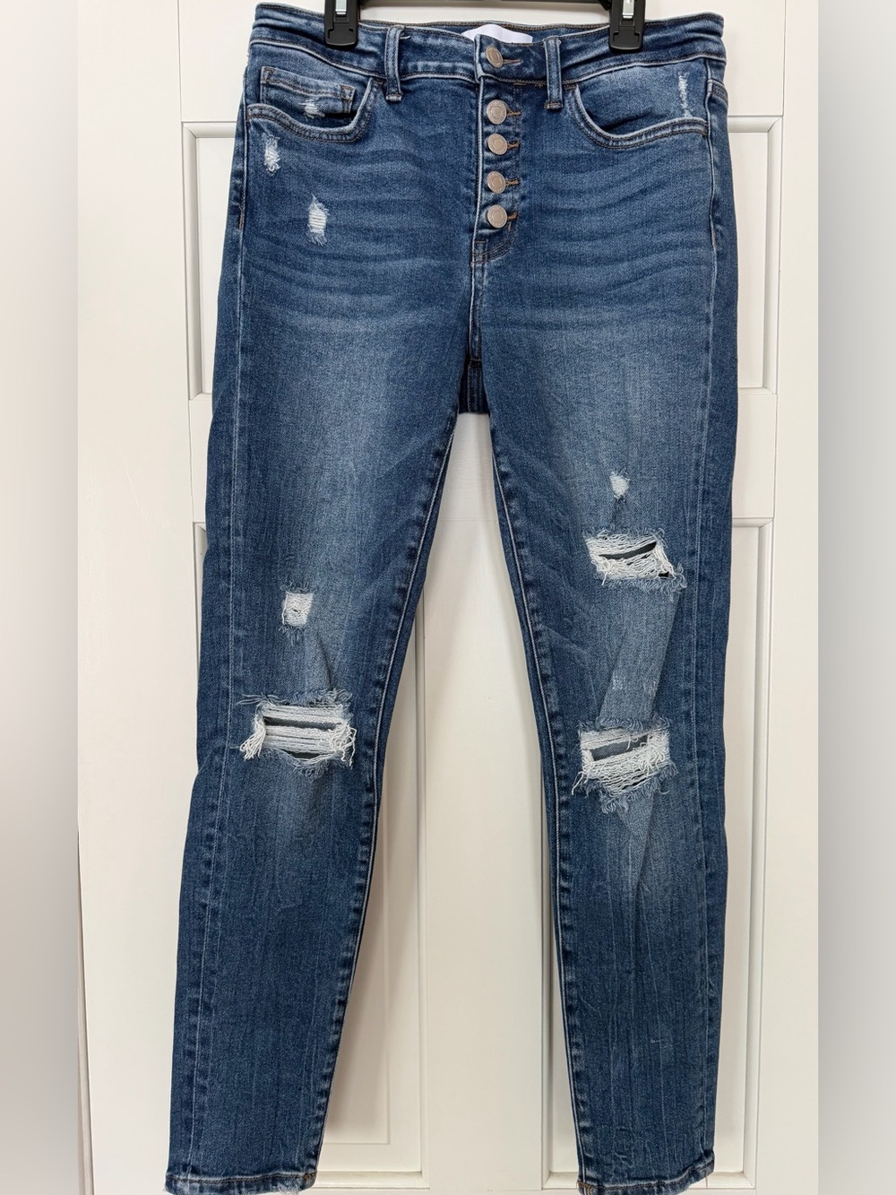 High-Rise Distressed Skinny Jeans in Medium Blue